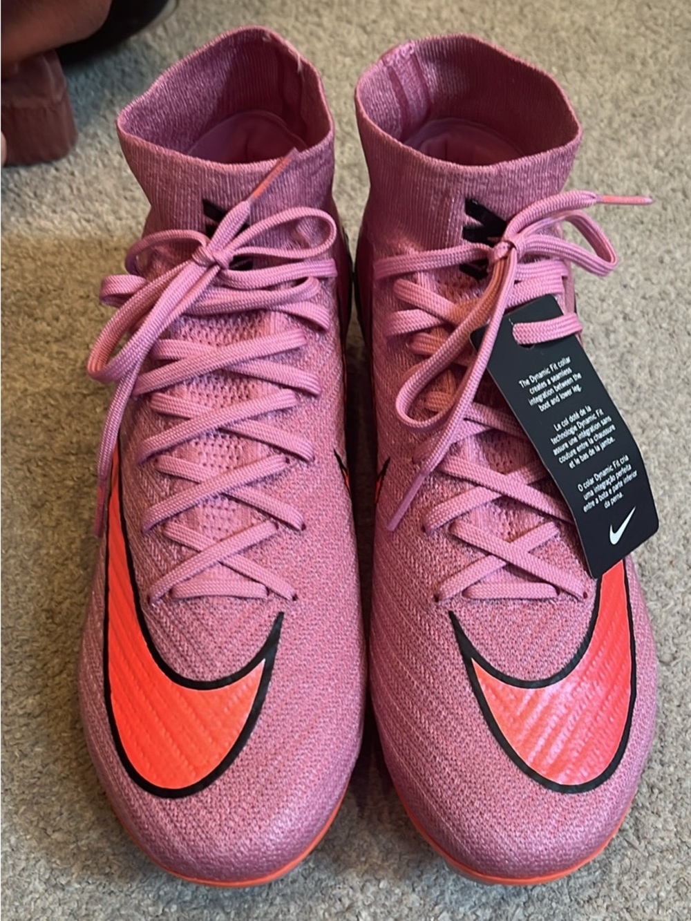 Nike mens or Women’s Pink High-Top Athletic Shoes with Coral Swoosh